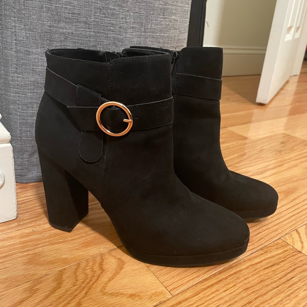 Lauren Conrad 4 inch high heeled black boots.